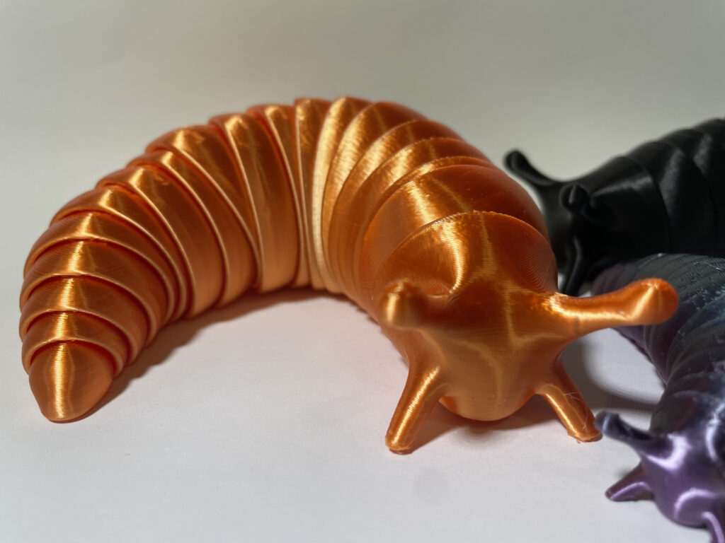 articulated slug fidget toy