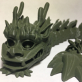 Smiling Articulated Lucky Dragon 3d printed flexible desk toy